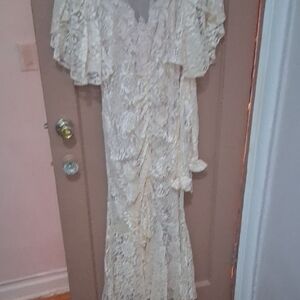 Elegant Cream Lace Dress With Extra Long Sleeves.